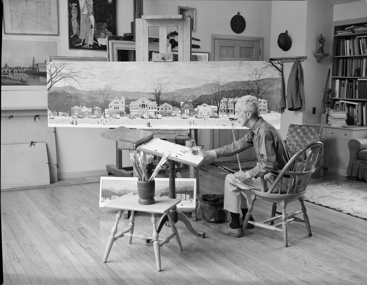 Norman Rockwell in his studio, painting Stockbridge Main Street at Christmas